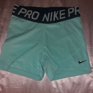Blue Nike Pros with Large Waistband